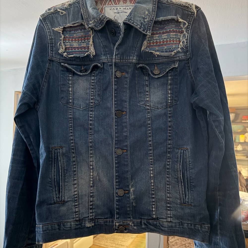 Zara Distressed Denim Jacket with Patterned Accents. Size: LARGE